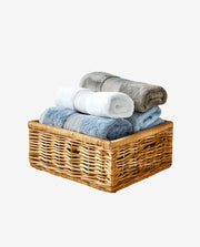 Wooden Basket with Clean Towels for Home Decor